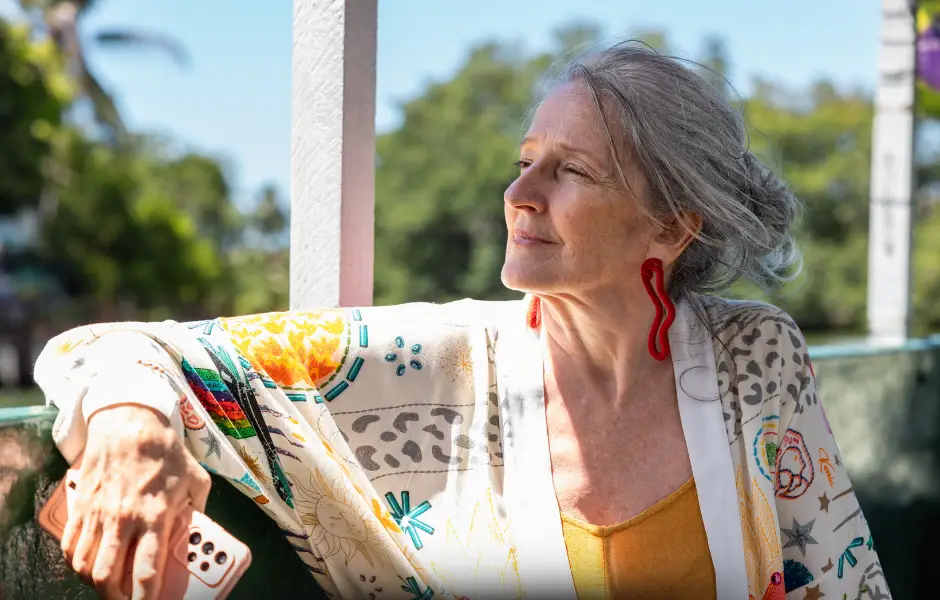 Image of a woman who is happy renting. Less hassles.